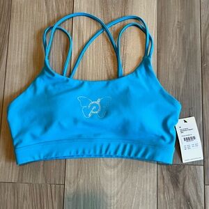 Peloton Brittany Allen sport bra blue w/ butterfly. Medium. NWT